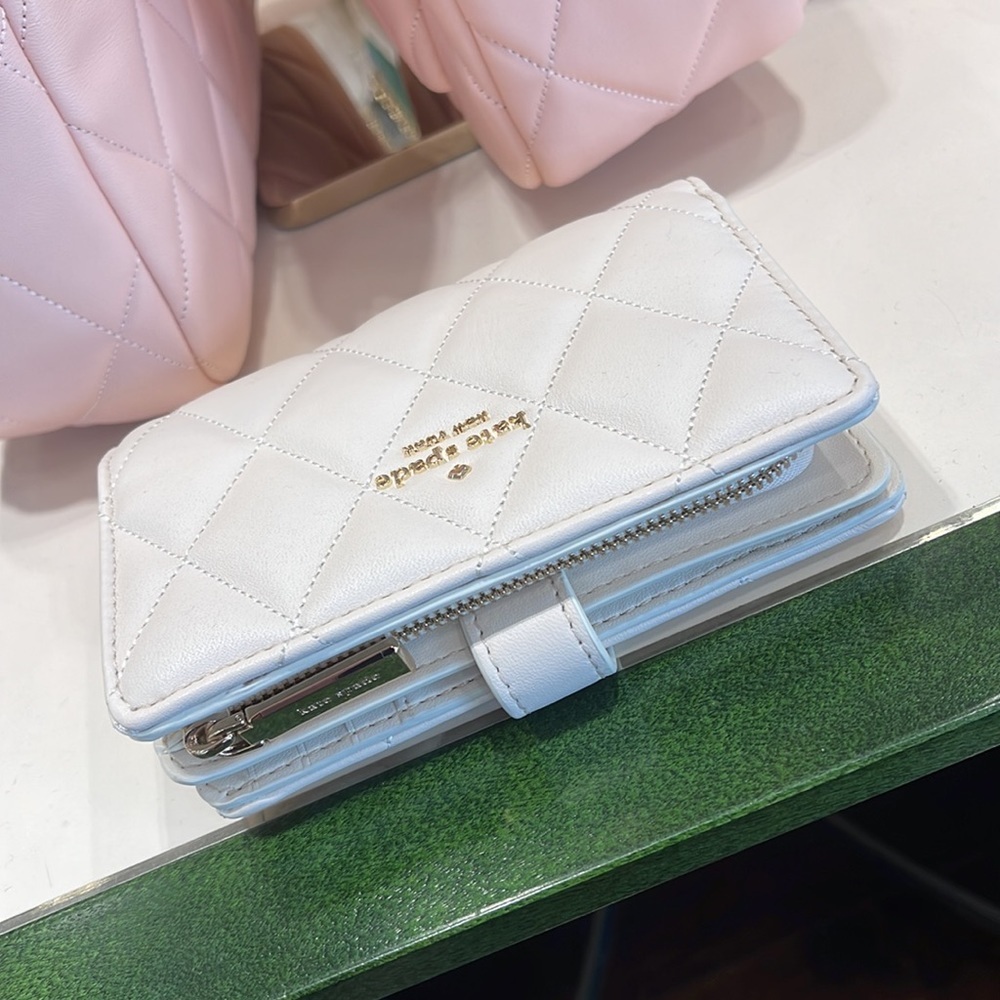 Kate Spade Carey Medium Compartment Bifold Wallet
COLOR: Parchment - Picture 7 of 16
